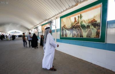 ضمن فعاليات أسبوع الغدير .. مركز المحسن ينشر جدارية مصورة تشير إلى بيعة الغدير في طريق زائري مرقد المولى أمير المؤمنين (عليه السلام) 